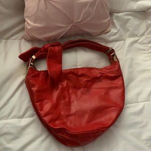 Badgley mischka blood orange purse.